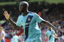 West Ham United's English striker Carlton Cole celebrates scoring a goal during a game in London on August 23, 2014