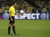 Match referee Proenca of Portugal holds ball during Euro 2012 quarter-final soccer match between Italy and England at Olympic Stadium in Kiev