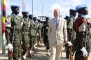 U.N. special representative for Somalia Kay inspects Ugandan peacekeeping troops during a ceremony at Mogadishu airport in Somalia
