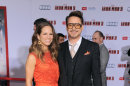 Robert Downey Jr and his wife Susan Downey arrive at the world premiere of Marvel's Iron Man 3