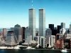FILE - In this 1990 file photo, New York City skyline with World Trade Center's twin towers in the center. Before the towers crumbled, before the doomed people jumped and the smoke billowed and the planes hit, the collective American memory summoned one fleeting fragment of beauty: a clear blue sky. (AP Photo, File)