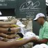 Tiger Woods signs autographs for fans after finishing his Pro-Am round at the Arnold Palmer Invitational golf tournament at Bay Hill, Wednesday, March 21, 2012, in Orlando, Fla. (AP Photo/John Raoux)