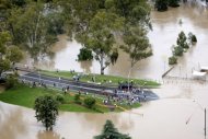 An aerial photo taken from a helicopter shows an extensively flooded area in the New South Wales town of Moree. Australia's flood crisis deepened with the weather bureau warning of a possible catastrophe in one region, as authorities continued to search for a woman swept away by the deluge