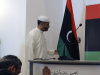 FILE- This file photo taken Aug. 21, 2011, shows a news conference at the Libyan consulate in Dubai, United Arab Emirates. Already, the Gulf has become a back office for the rebels. The leadership of a reconstruction planning team has set up shop at least temporarily at Libya's Dubai consulate, which is flying the rebel flag.  (AP Photo/Kamran Jebreili, File)