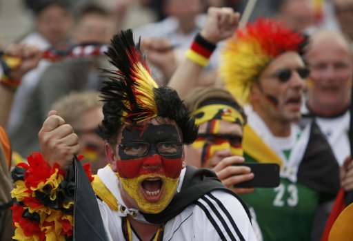 Germany soccer fans make their way to the National stadium in Warsaw