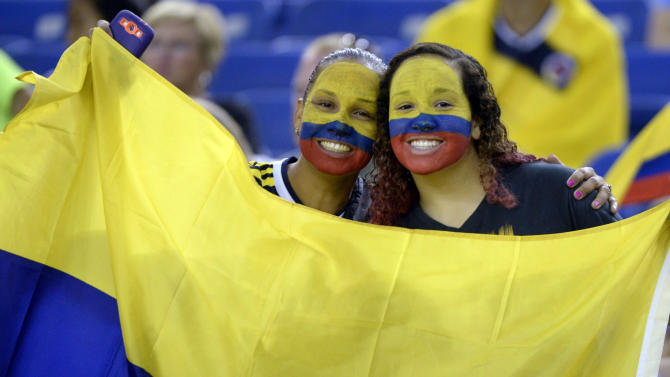 Colombia fans show their pride before a FIFA Women&#39;s World Cup soccer match against England, Wednesday, June 17, 2015, in Montreal, Canada. (Paul Chiasson/The Canadian Press via AP) MANDATORY CREDIT