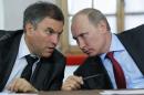 FILE - In this Monday, May 23, 2011 file photo, then, Russian Prime Minister Vladimir Putin, right, speaks with his then Chief of Staff ,Vyacheslav Volodin, during a meeting of officials in Pskov, about 600 km (375 miles) northwest of Moscow. The U.S. Department of the Treasury on Monday, April 28, 2014, designated seven Russian government officials, including two key members of the Russian leadership's inner circle, and 17 entities pursuant to Executive Order (E.O.) 13661. E.O. 13661 authorizes sanctions on, among others, officials of the Russian Government and any individual or entity that is owned or controlled by, that has acted for or on behalf of, or that has provided material or other support to, a senior Russian government official. Volodin is on the list. (AP Photo/RIA Novosti, Alexei Nikolsky, Pool, File)