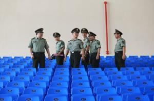 Chinese army advisors walk at a classroom after a graduation …