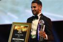 Algerian and Leicester forward Riyad Mahrez poses for a photo after being crowned African Footballer of the Year in Abuja, on January 5, 2017
