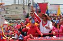 In this photo released by Miraflores Press Office, Venezuela's acting President Nicolas Maduro waves to the crowd as he campaigns in Cabimas, Zulia state, Venezuela, Thursday, April 11, 2013. Maduro, late President Hugo Chavez's hand-picked successor, is running for president against opposition candidate Henrique Capriles on April 14. (AP Photo/Miraflores Press Office)