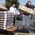 In this Aug. 26, 2011 photo, shoppers unload their items at Costco in Mountain View, Calif. Consumers rebounded in July to lift spending after the first decline in 20 months. The boost is likely to ease fears that the U.S. economy is on the verge of another recession. (AP Photo/Paul Sakuma)