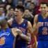 New York Knicks guard Jeremy Lin (17) celebrates with teammates Tyson Chandler and Landry Fields (2) after his game-winning 3-pointer against the Toronto Raptors in an NBA basketball game in Toronto on Tuesday, Feb. 14, 2012. (AP Photo/The Canadian Press, Frank Gunn)