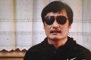 FILE- This file image made from video posted to YouTube April 27, 2012 by by overseas Chinese news site Boxun.com, shows blind legal activist Chen Guangcheng. U.S. Assistant Secretary of State Kurt Campbell arrived early Sunday, April 29 in Beijing on a hastily arranged trip as problems from the escape of a blind legal activist to possible new arms sales to Taiwan threaten to derail fragile U.S.-China co-operation. His trip comes after activist Chen Guangcheng escaped from house arrest in his rural village (AP Photo/Boxun.com, File)