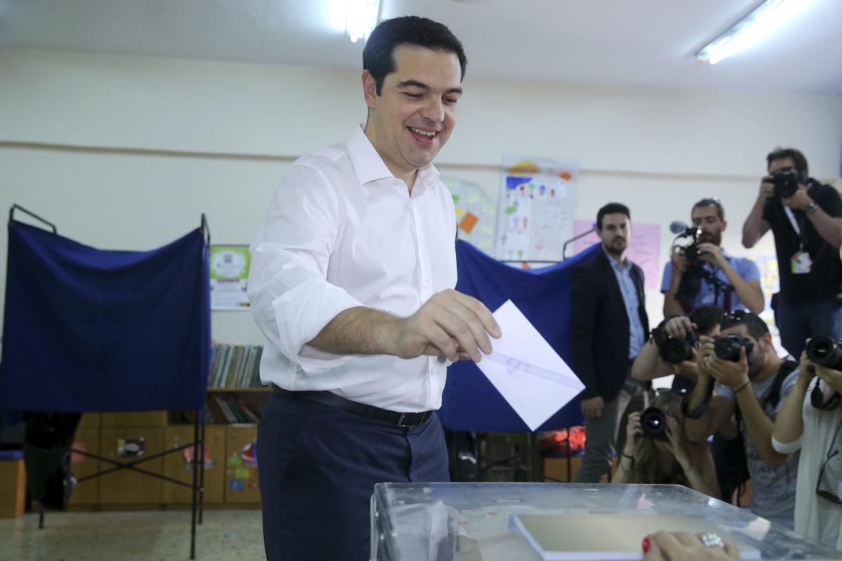 Greek Prime Minister Alexis Tsipras votes at a polling station in Athens