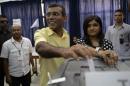 Maldivian Democratic Party presidential candidate Nasheed, who was ousted as president in 2012, casts his vote at a polling station during the presidential elections in Male