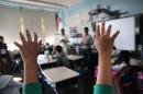 New York public schools, students in class seen here, will add two Muslim holidays to their vacation calendars, Mayor Bill de Blasio said Wednesday, a promise he made during his election campaign