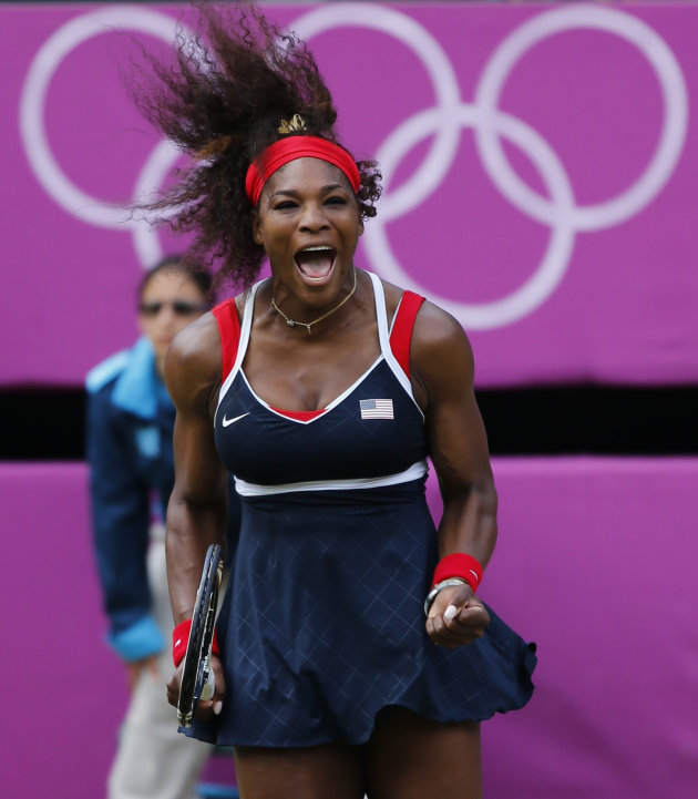 Serena Williams of the U.S. celebrates after winning the women&#39;s singles gold medal match against  Russia&#39;s Sharapova at the All England Lawn Tennis Club during the London 2012 Olympic Games