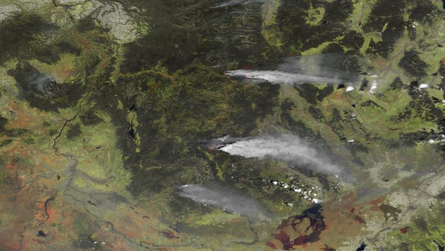 NOAA satellite image of wildfires burning across the Western U.S.
