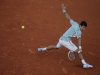 Serbia's Novak Djokovic returns against Bulgaria's Grigor Dimitrov in their third round match at the French Open tennis tournament, at Roland Garros stadium in Paris, Saturday, June 1, 2013. Djokovic won in three sets. (AP Photo/Michel Spingler)