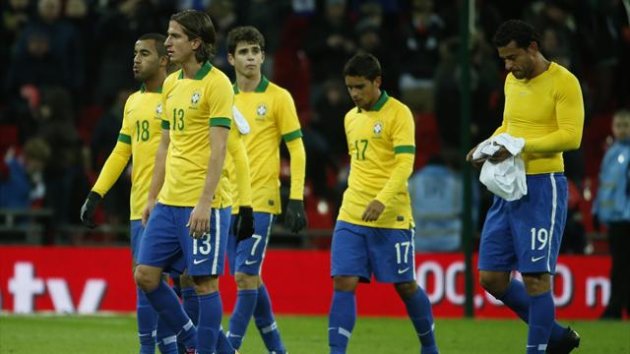 Brazil's Lucas, Felipe Luis, Oscar, Jean and Fred (L-R) walk off the pitch after the friendly against England at Wembley (Reuters)