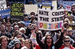 Demonstrators gather to protest a controversial religious &hellip;