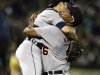 Detroit Tigers' Jose Valverde, right, lifts catcher Alex Avila as they celebrate on the mound after the Tigers clinched the AL Central Division title at the end of a baseball game against the Oakland Athletics, Friday, Sept. 16, 2011, in Oakland, Calif. (AP Photo/Ben Margot)