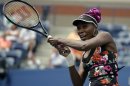 Venus Williams returns a shot to Belgium's Kirsten Flipkens during the first round of the 2013 U.S. Open tennis tournament Monday, Aug. 26, 2013, in New York. Williams defeated Flipkens. (AP Photo/David Goldman)