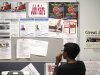A job seeker looks at a bulletin at the Texas Workforce Commission's Workforce Solutions of Greater Dallas job resource center in Richardson, Texas Tuesday, July 5, 2011. The number of people applying for unemployment benefits fell last week to the lowest level in seven weeks, although applications remain elevated.  (AP Photo/LM Otero)