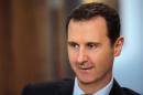 Syrian President Bashar al-Assad listens to a question during an interview with AFP in the capital Damascus on February 11, 2016