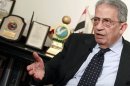 Opposition leader Amr Moussa, a former Arab League secretary-general and Egyptian foreign minister, talks to Reuters during an interview in Cairo