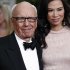 Rupert Murdoch and his wife Wendi arrive at the 69th Annual Golden Globe Awards Sunday, Jan. 15, 2012, in Los Angeles. (AP Photo/Matt Sayles)