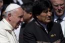 Bolivia's President Evo Morales escorts Pope Francis as the pope prepares to depart Viru Viru airport in Santa Cruz, Bolivia, Friday, July 10, 2015. The pope is departing for Paraguay as part of his three-nation South American tour. (AP Photo/Eduardo Verdugo)