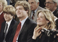 FILE - In this Dec. 1, 1982 file photo, the children of Sen. Edward M. Kennedy, D-Mass., from left, Patrick, Edward M. Jr., and Kara, listen to their father speak during a Capitol Hill news conference in Washington. Kara, the oldest child of the late Sen. Kennedy, died Friday, Sept. 16, 2011, at a Washington-area health club, Patrick Kennedy told The Associated Press. She was 51. (AP Photo/Ira Schwarz, File)