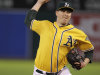 Oakland Athletics' Trevor Cahill works against the Detroit Tigers during the first inning of a baseball game on Friday, Sept. 16, 2011, in Oakland, Calif. (AP Photo/Ben Margot)