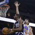 Oklahoma Thunder forward Kevin Durant (35) goes up for a shot against Golden State Warriors' Andrew Bogut during the first half of an NBA basketball game Thursday, April 11, 2013, in Oakland, Calif. (AP Photo/Ben Margot)