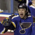 FILE - This is a April 13 2004 file photo of St. Louis Blues' Mike Danton as he  is congratulated by teammates  after his first-period goal against the San Jose Sharks in Game 4  of the first round of the NHL playoffs  in St. Louis USA. Mike Danton played the hero in his opening game of the Swedish league. The former NHL player, who served five years behind bars for a failed murder-for-hire plot, rushed to the aid of IFK Ore teammate Marcus Bengtsson, who was convulsing on the ice after a hard hit in the Sunday Sept. 18, 2011, season-opener. Danton, 30, was released from prison in 2009 and then played two seasons with Saint Mary's Huskies in Canadian university hockey before signing this summer with IFK Ore, which plays in the third tier of Sweden's pro system.< (AP Photo/Bill Boyce,file)