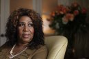 In this July 26, 2010 photo, performer Aretha Franklin looks out a window, in Philadelphia. Franklin says she believed Whitney Houston had overcome her demons and was primed for a comeback, which made learning of the troubled singer's death all the more of a shock. Interviewed on NBC's 
