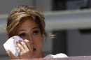 Lopez wipes a tear before unveiling her star on Walk of Fame in Hollywood