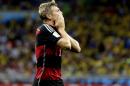 Germany's Toni Kroos celebrates after scoring his side's third goal during the World Cup semifinal soccer match between Brazil and Germany at the Mineirao Stadium in Belo Horizonte, Brazil, Tuesday, July 8, 2014. (AP Photo/Natacha Pisarenko)