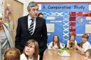 Former British Prime Minister Gordon Brown and NO campaigner in Scotland's Independence Referendum meets pupils at Kelty Primary school in Kelty Scotland Friday Sept. 19, 2014. Voters in Scotland resoundingly rejected independence in a historic referendum that shook the country to its core. But No does not mean a return to the status quo. The referendum led to promises of further powers for each of the four nations in the United Kingdom _ a pledge that will change the country forever. (AP Photo/Garry F McHarg/PA) UNITED KINGDOM OUT