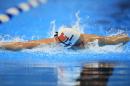 Cammile Adams swims in the women's 200-meter butterfly preliminaries at the U.S. Olympic swimming trials, Wednesday, June 29, 2016, in Omaha, Neb. (AP Photo/Orlin Wagner)