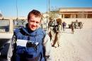 Reporter Dean Yates is pictured with U.S. troops near Tikrit
