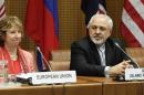 European Union foreign policy chief Ashton and Iranian Foreign Minister Zarif wait for start of talks in Vienna
