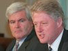 FILE - In this July 29, 1996, file photo, House Speaker Newt Gingrich listens as President Clinton talks to reporters in the Cabinet Room of the White House prior to a meeting to discuss terrorism. To hear Republican presidential contender Gingrich tell it, he and Clinton were political partners in the 1990s, lowering unemployment, balancing the federal budget and keeping the nation's economy in robust health. In fact, the economy wasn’t as rosy as he’s claiming during his time in leadership. And the Clinton-Gingrich relationship was marked by intense cycles of warfare and courtship. (AP Photo/Joe Marquette, File)