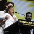 Director Benh Zeitlin, left, holds up actress Quvenzhane Wallis as they accept the Grand Jury Prize Dramatic award for the film "Beasts of the Southern Wild" during the 2012 Sundance Film Festival Awards Ceremony in Park City, Utah on Saturday, Jan. 28, 2012. (AP Photo/Danny Moloshok)