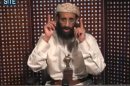 FILE - In this Nov. 8, 2010 file image taken from video and released by SITE Intelligence Group on Monday, Anwar al-Awlaki speaks in a video message posted on radical websites. Al-Awlaki, a key member of al-Qaida in the Arabian Peninsula, was killed on Sept. 30, 2011 in a drone strike in the mountains of Yemen. The 40-year-old American-Yemeni cleric emerged as an enormously influential preacher among militants living in the West, with his English-language Internet sermons calling for jihad, or holy war, against the United States. He was in contact with the accused perpetrators of the 2009 shooting rampage at Fort Hood that killed 13 people, the 2010 car bomb attempt in New York's Times Square and the Christmas 2009 attempt to blow up an airliner heading to Detroit.(AP Photo/SITE Intelligence Group, File)