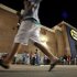 Shoppers stand in line outside a Best Buy department store before the store's opening at midnight for a Black Friday sale, Thursday, Nov. 22, 2012, in Arlington, Texas. Despite a surge of resistance as the sales drew near, with scolding editorials and protests by retail employees and reminders of frantic tramplings past, Black Friday's grip on America may have been proven stronger than ever. (AP Photo/Tony Gutierrez)