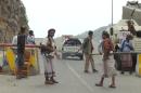 Armed supporters of Yemeni President Abedrabbo Mansour Hadi take to the streets on February 24, 2015, in Aden to protect Hadi after he made a surprise escape from house arrest in Sanaa days before