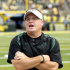In this Sept. 4, 2010, Oregon coach Chip Kelly calls to his team during an NCAA college football game with New Mexico in Eugene, Ore. Questions at Pac-12 media day about how Oregon and Kelly expect to build on recent success will no doubt be replaced Tuesday, July 26, by questions about the Ducks' relationship with Willie Lyles. The NCAA is investigating whether Oregon broke any rules in its association with Lyles. It would be a violation if he steered a recruit to the Ducks. (AP Photo/Rick Bowmer)