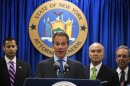 New York Attorney General Schneiderman speaks at a news conference announcing an organized crime task force take down of an unstamped cigarette trafficking ring in New York